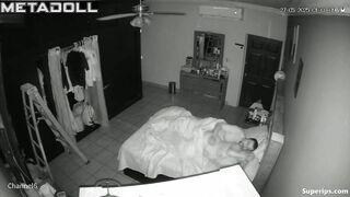 Naked couple kissing passionetly under the blanket