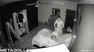 Naked couple kissing passionetly under the blanket