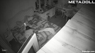 Cute teen girl seductively spreads her legs while looking at her phone