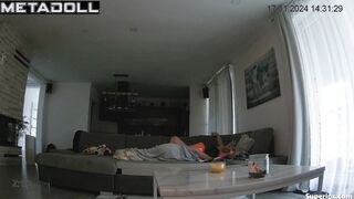 A guy teases his girlfriend's nipples while she sits on his cock
