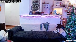 They kissing hotly near the New Year tree - living room tape