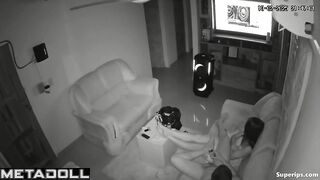 Tired couple scrolls their phone after hard working day