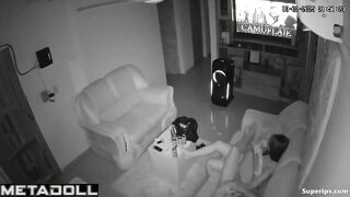 Tired couple scrolls their phone after hard working day