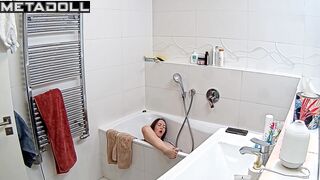 Sexy lady in perfect fit masturbating under running water
