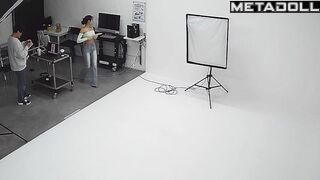 Slim asian girl taking part in a photoshoot for clothing brand