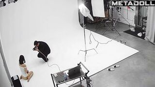 Slim asian girl taking part in a photoshoot for clothing brand