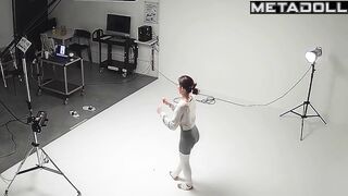 Slim asian girl taking part in a photoshoot for clothing brand