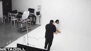 Slim asian girl taking part in a photoshoot for clothing brand