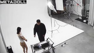 Slim asian girl taking part in a photoshoot for clothing brand