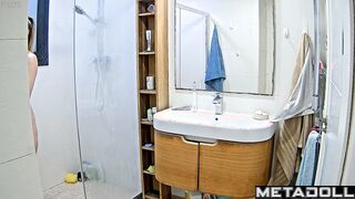 Pretty blonde playing solo game in the shower cabin