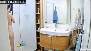 Pretty blonde playing solo game in the shower cabin
