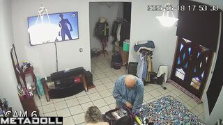 Couple is getting ready for work together (and watching tv)