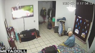 Couple is getting ready for work together (and watching tv)