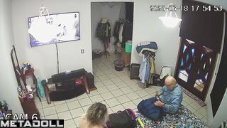 Couple is getting ready for work together (and watching tv)
