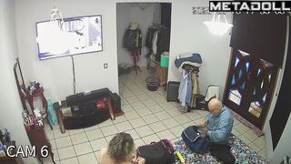 Couple is getting ready for work together (and watching tv)