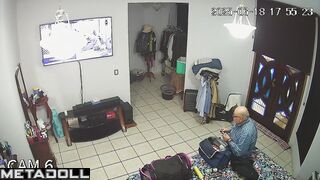 Couple is getting ready for work together (and watching tv)