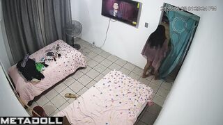 Long-haired brunette dressing for a date, home video