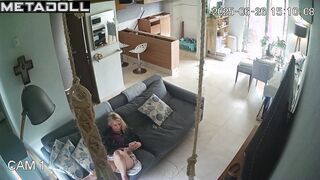 She talks on the phone with her lover while husband is away