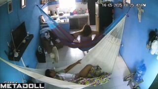 They hung two hammocks in the living room for sex games