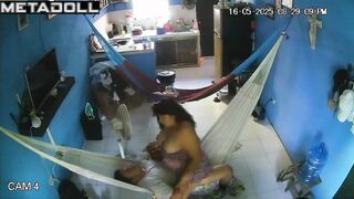 They hung two hammocks in the living room for sex games