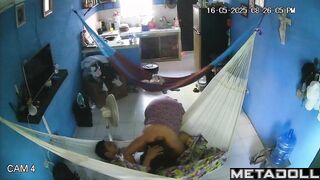 They hung two hammocks in the living room for sex games