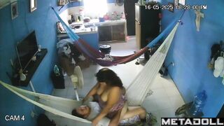 They hung two hammocks in the living room for sex games