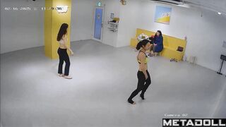 Asian girls dancing sexy in the dance hall, public camera