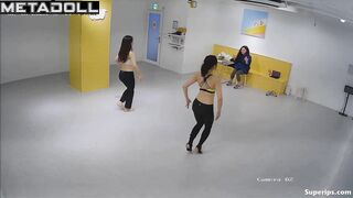 Asian girls dancing sexy in the dance hall, public camera
