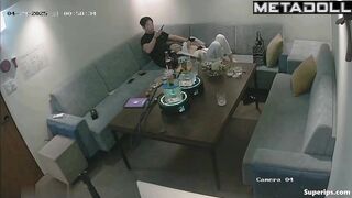 The young couple kissed and teased each other in the restaurant
