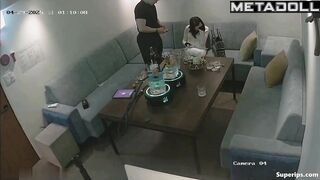 The young couple kissed and teased each other in the restaurant