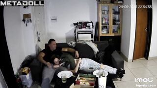 A young couple drinks wine after work and engages in oral sex
