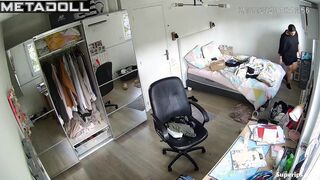 A fat brunette is getting dressed in her bedroom after taking a shower