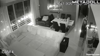 A married couple is actively testing a new sofa in the hall of their villa