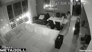 A married couple is actively testing a new sofa in the hall of their villa