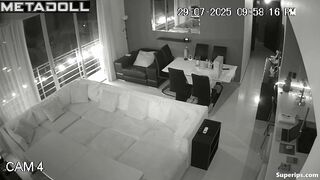 A married couple is actively testing a new sofa in the hall of their villa