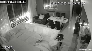 A married couple is actively testing a new sofa in the hall of their villa