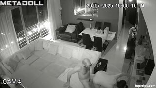 A married couple is actively testing a new sofa in the hall of their villa