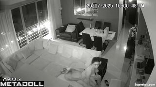 A married couple is actively testing a new sofa in the hall of their villa