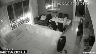 A married couple is actively testing a new sofa in the hall of their villa