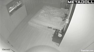 The camera blinked silently, hidden in the shadows