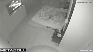 The camera blinked silently, hidden in the shadows