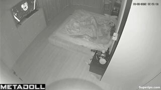 The camera blinked silently, hidden in the shadows