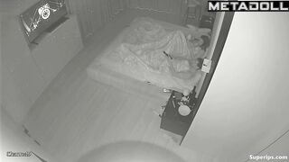 The camera blinked silently, hidden in the shadows