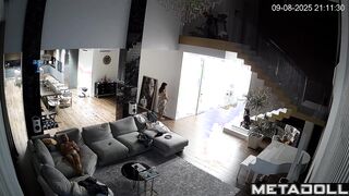 Spouses spending a day at huge living room together