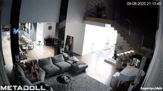 Spouses spending a day at huge living room together