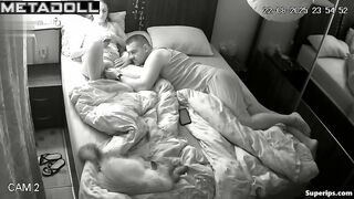 Couple relaxes together at home, surrounded by soft silence