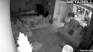 Couple fooling around on the sofa, forgetting the ticking clock