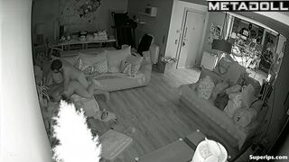 Couple fooling around on the sofa, forgetting the ticking clock
