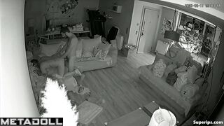 Couple fooling around on the sofa, forgetting the ticking clock