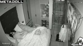 Couple whispers quietly, forgetting the silence in the room
